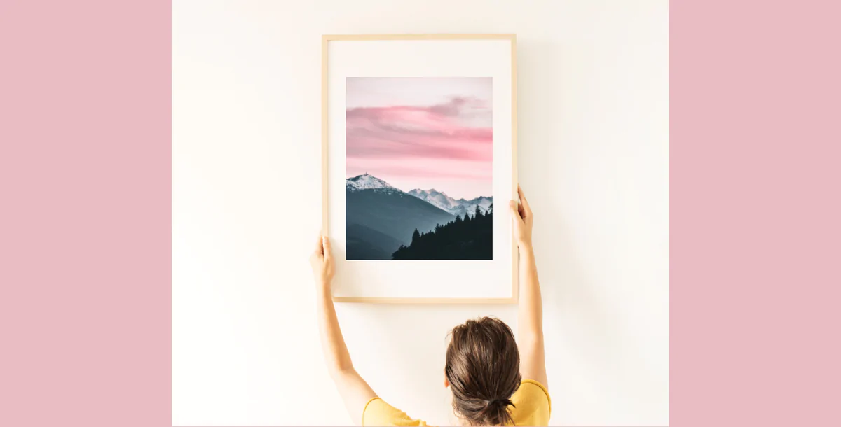 Wall Frame Mockup with Person Holding Poster – Realistic Minimal Scene